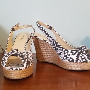 Brown and White slingback wedges.